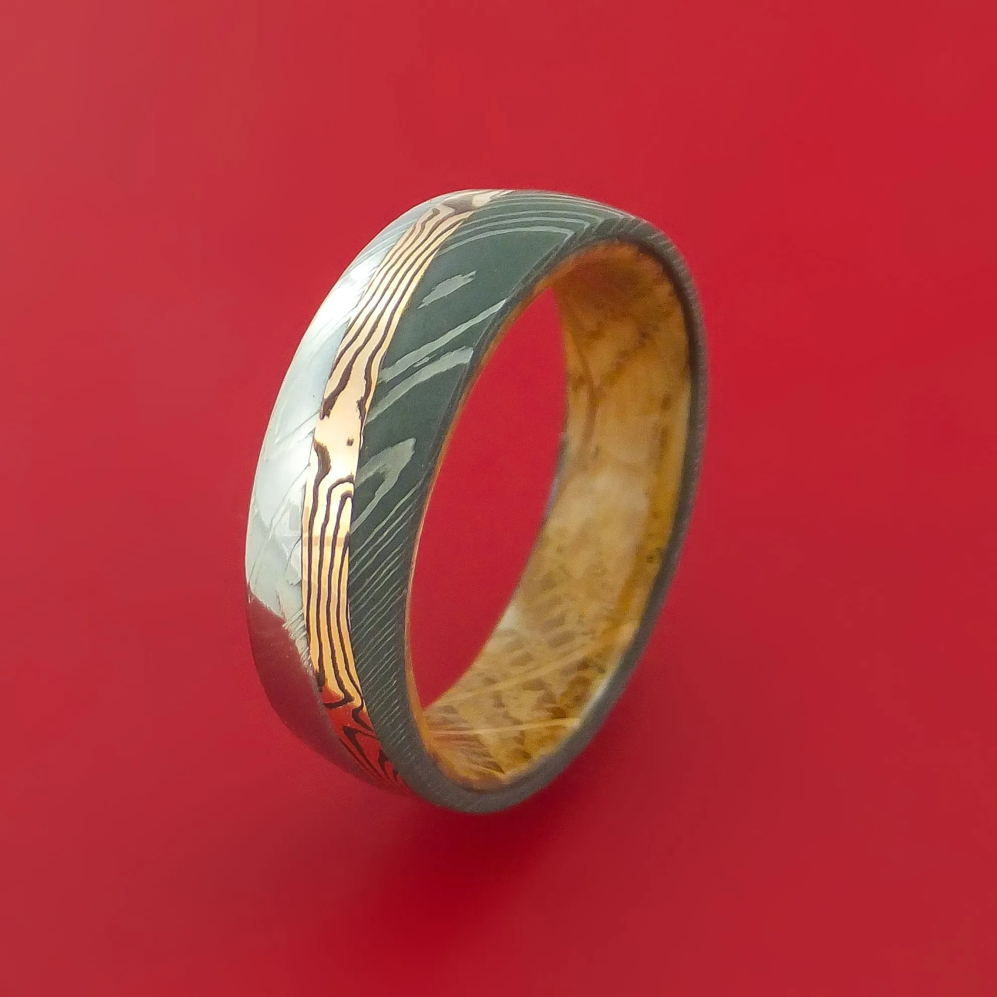 Damascus Steel Ring with 14k Rose Gold Mokume Shakudo Inlay and Interior Hardwood Sleeve Custom Made Band