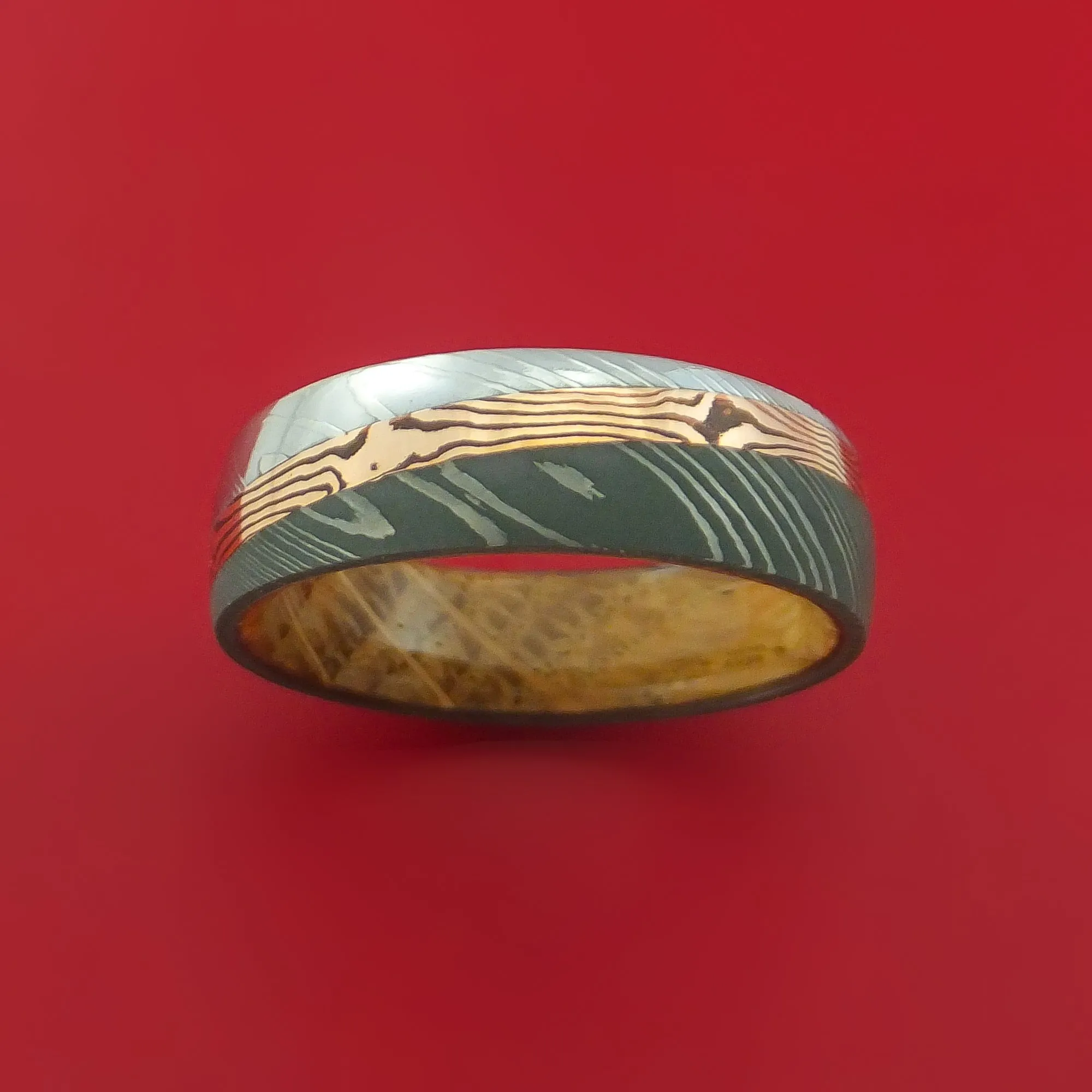 Damascus Steel Ring with 14k Rose Gold Mokume Shakudo Inlay and Interior Hardwood Sleeve Custom Made Band