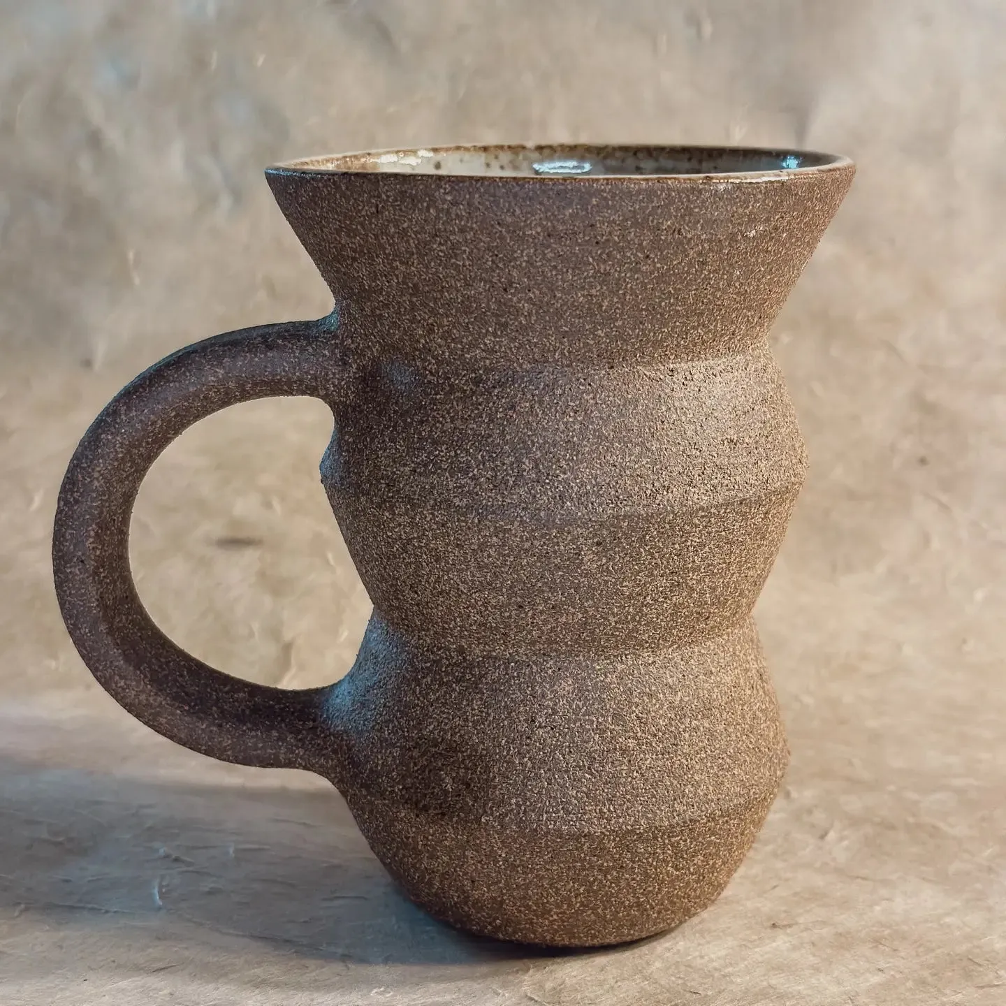 olivia snow / angled mug - brown