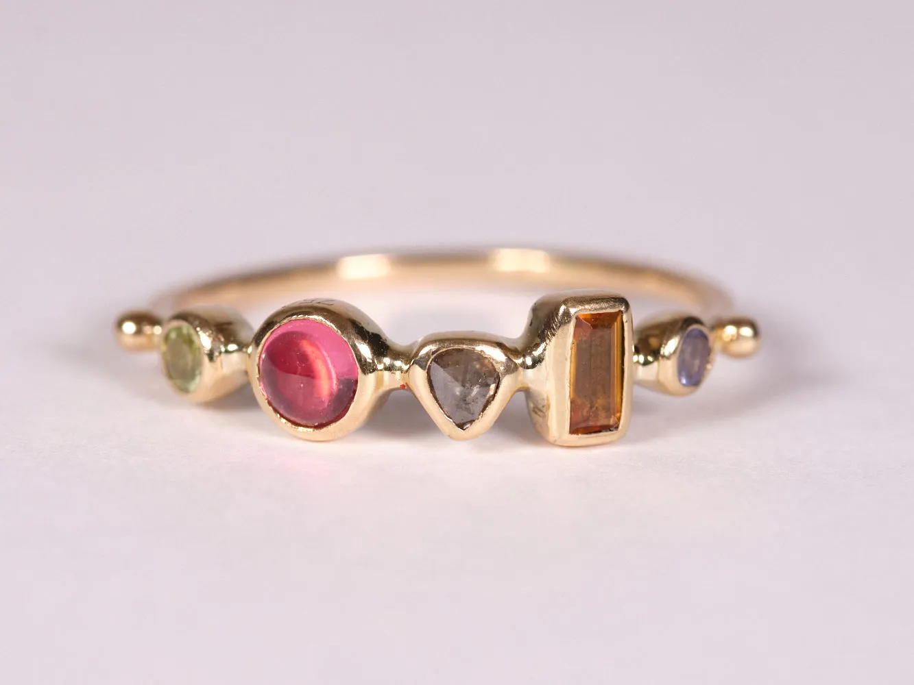 simple ring band - chrysoberyl   spinel   diamond   orange sapphire   tanzanite