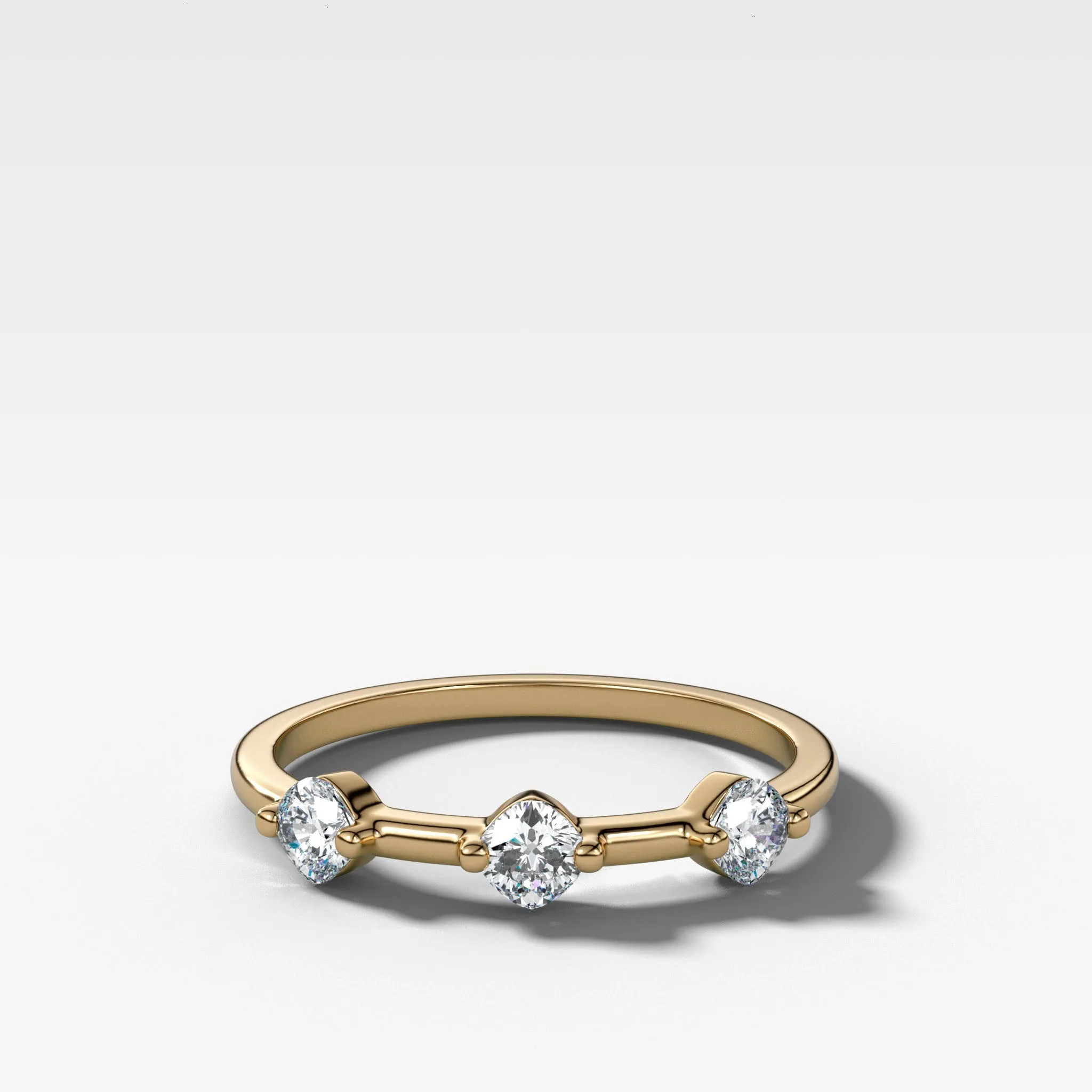 Spaced Compass Wedding Band with Three Cushion Cuts