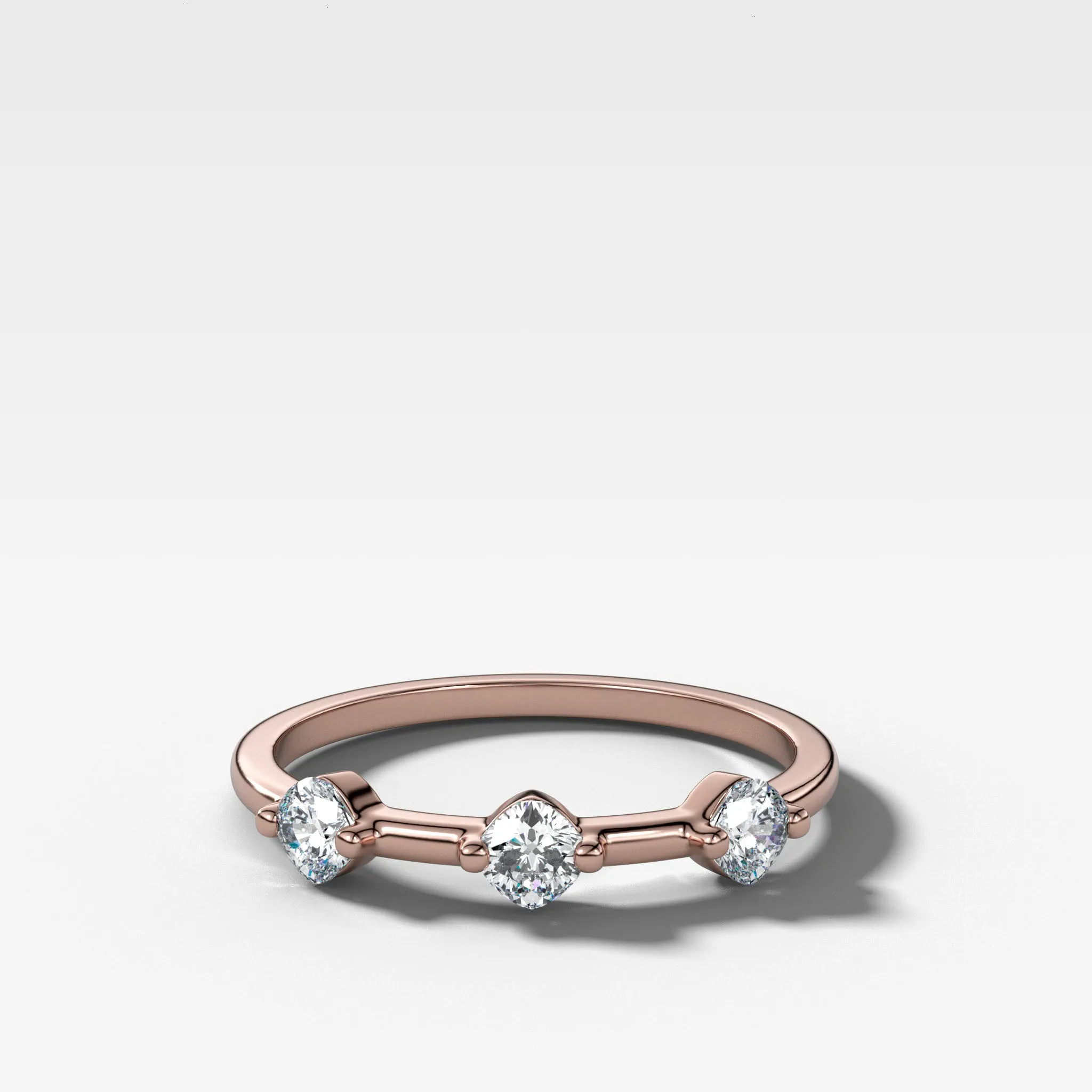 Spaced Compass Wedding Band with Three Cushion Cuts