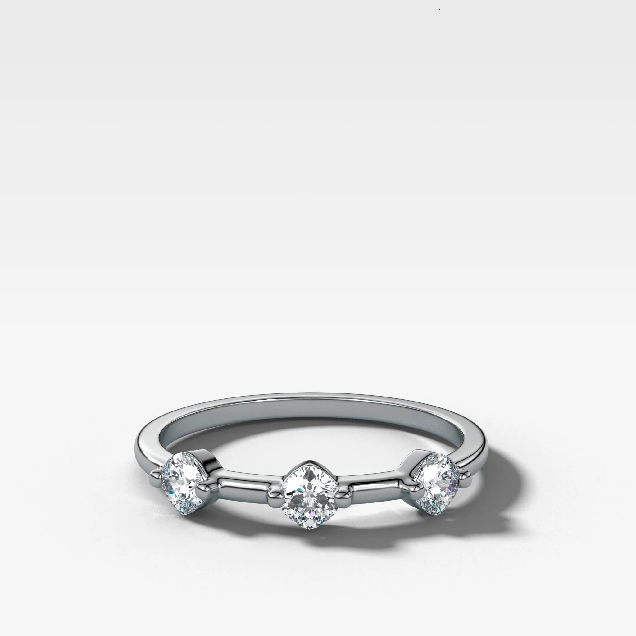 Spaced Compass Wedding Band with Three Cushion Cuts