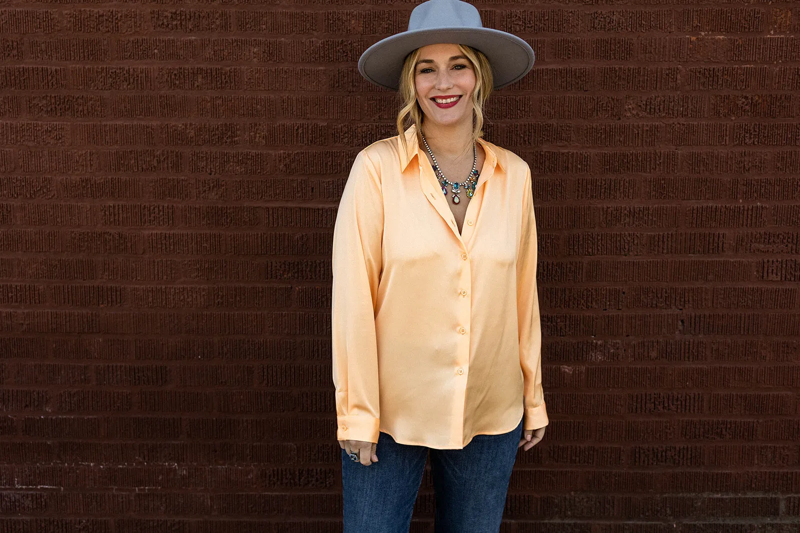 tandy button down in bright cantaloupe