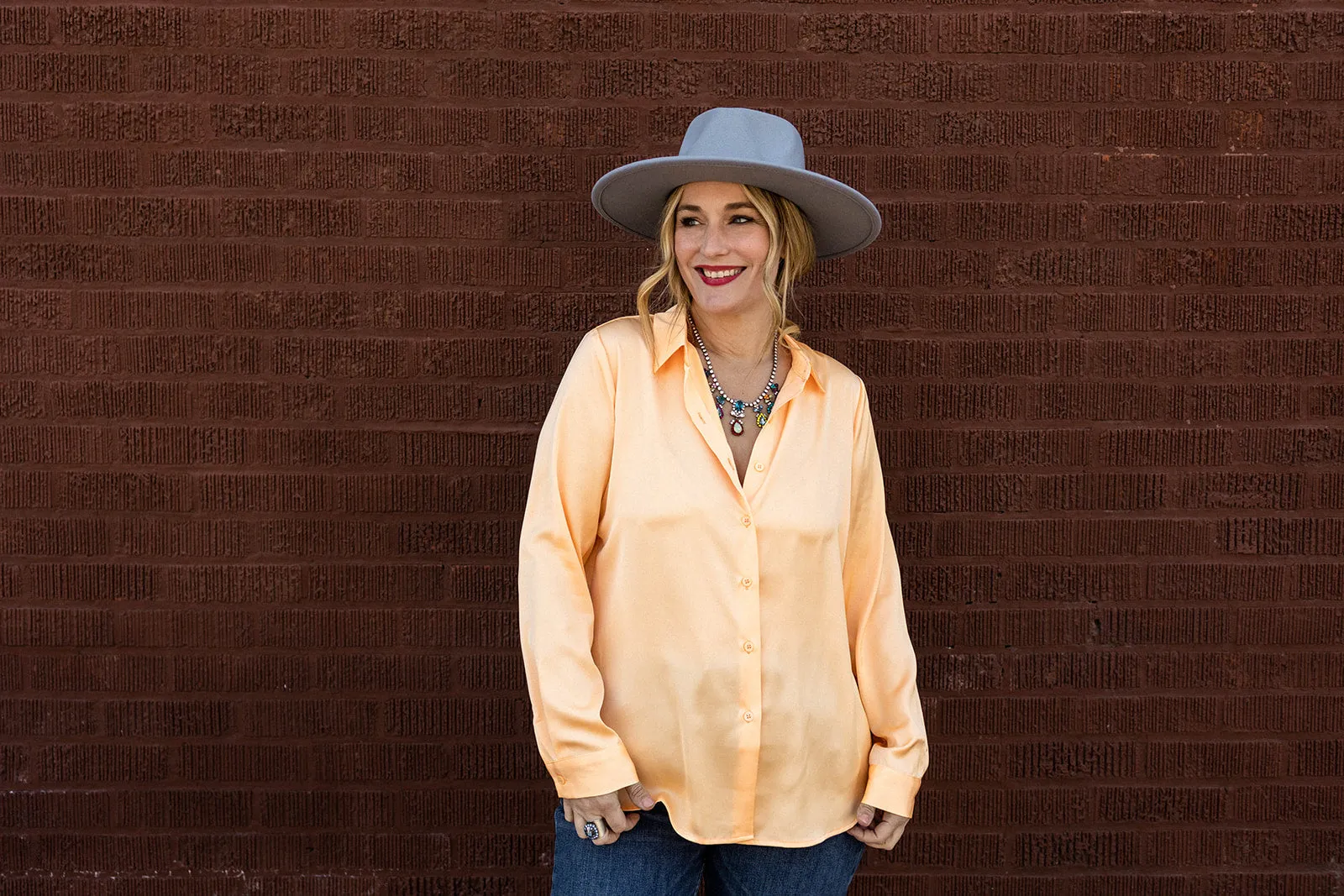 tandy button down in bright cantaloupe