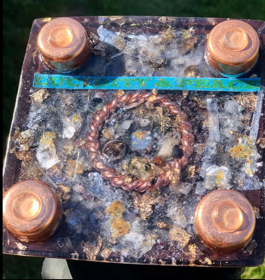 The “Sleek Tensor Ring Nubian Chakra” Orgone Pyramid
