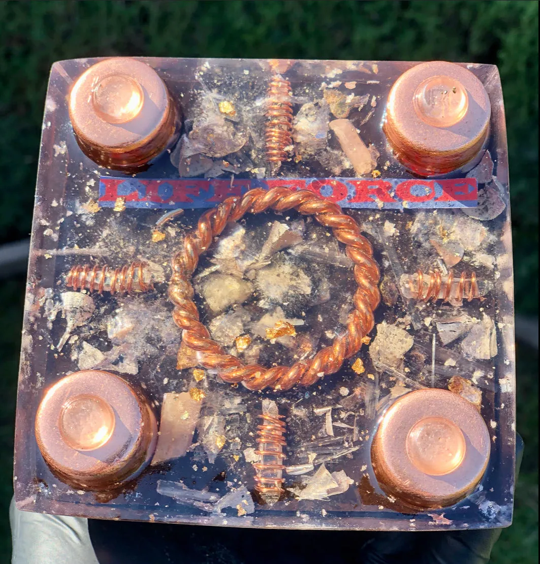 The “Sleek Tensor Ring Nubian Chakra” Orgone Pyramid